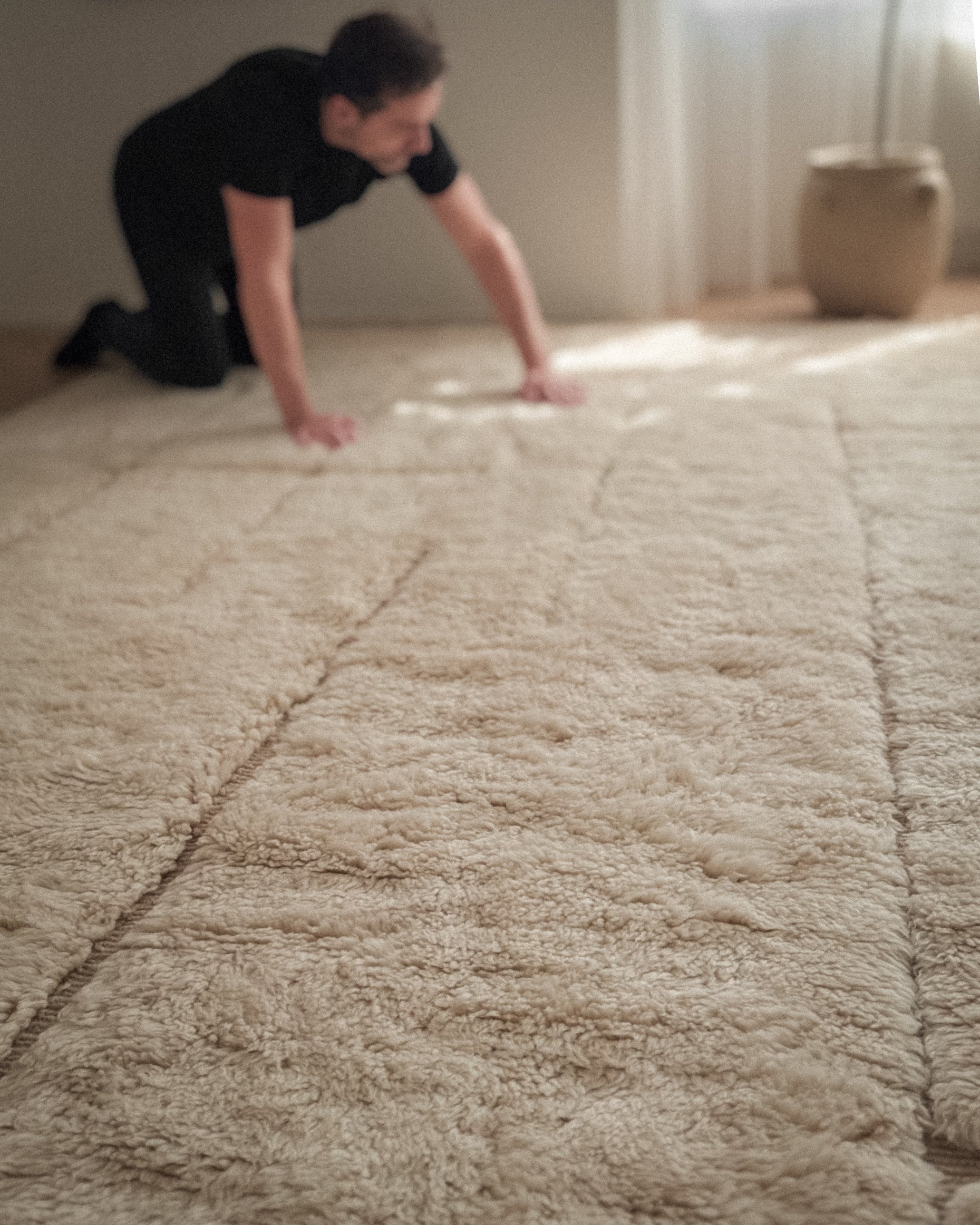 Handwoven Moroccan wool rug Beni Mrirt No. 4 shown in interior with artisan detail