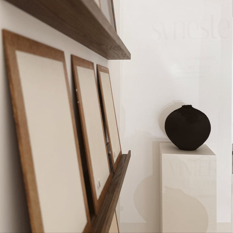 Display of colour samples in Syneste studio, showcasing a wide selection of shades and finishes for custom wall and floor designs.