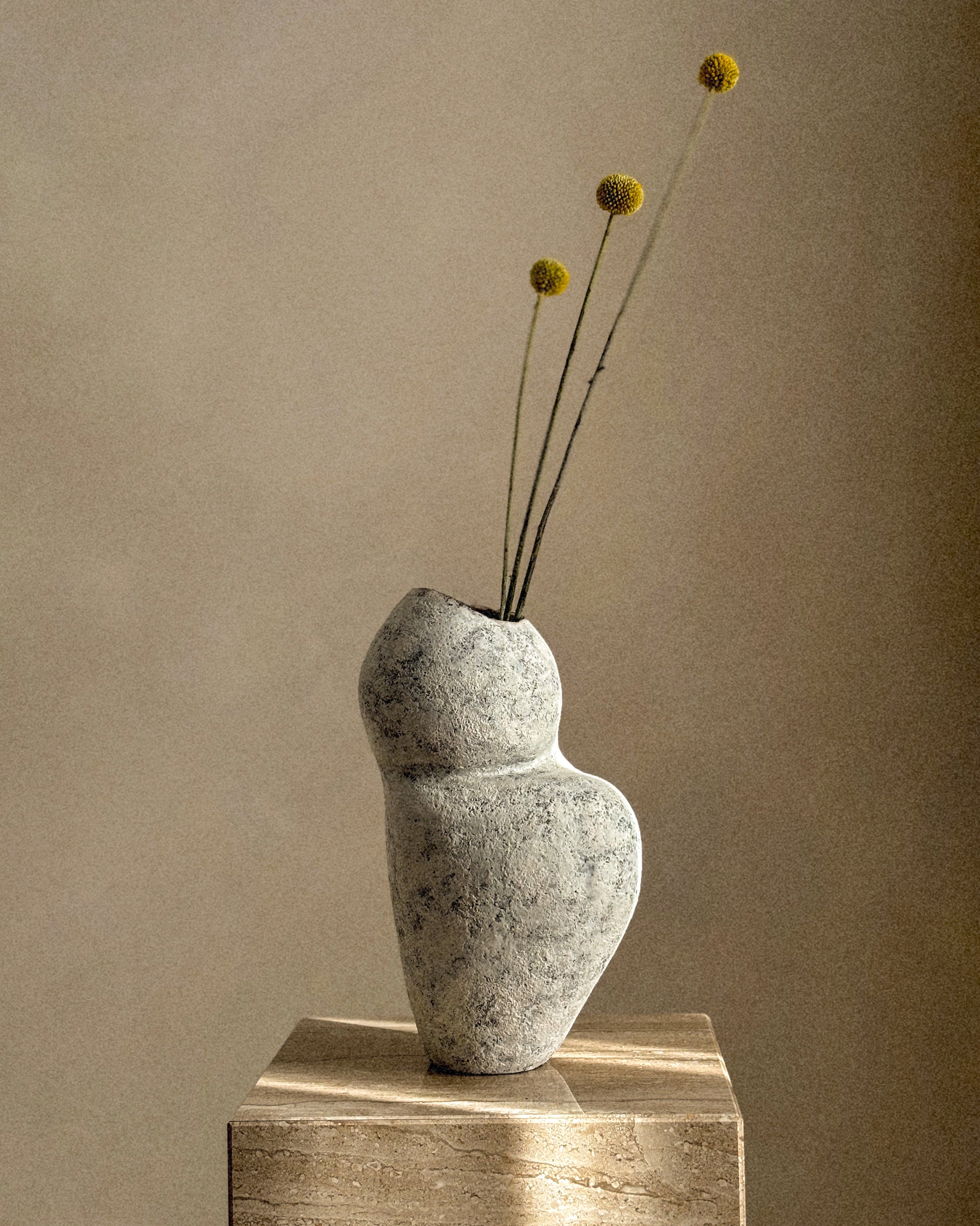 Li Ceramics grey handmade vase with dried stems styled on pedestal