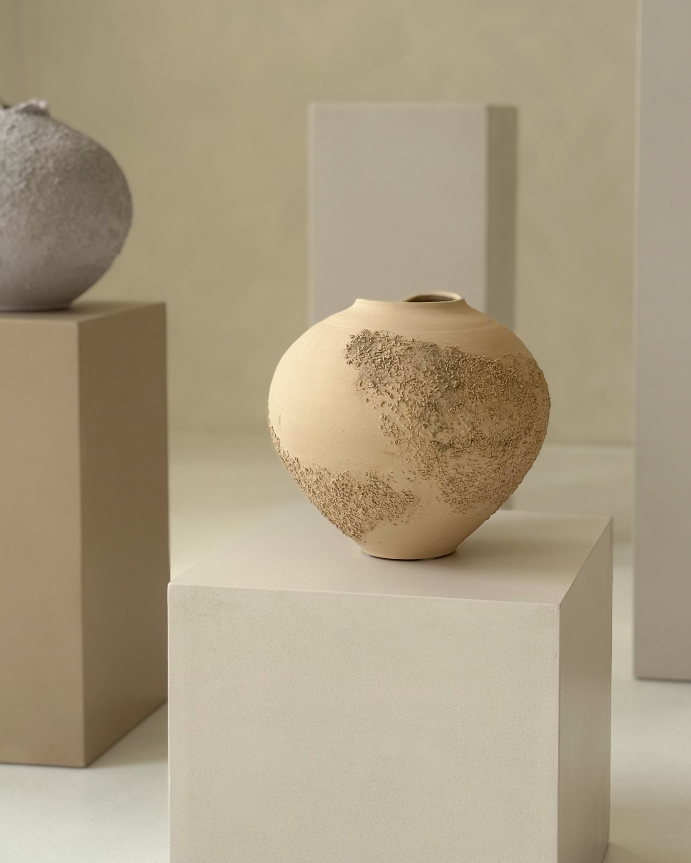 Sabi Vase no. 1, sculptural handmade ceramic vase styled on pedestal