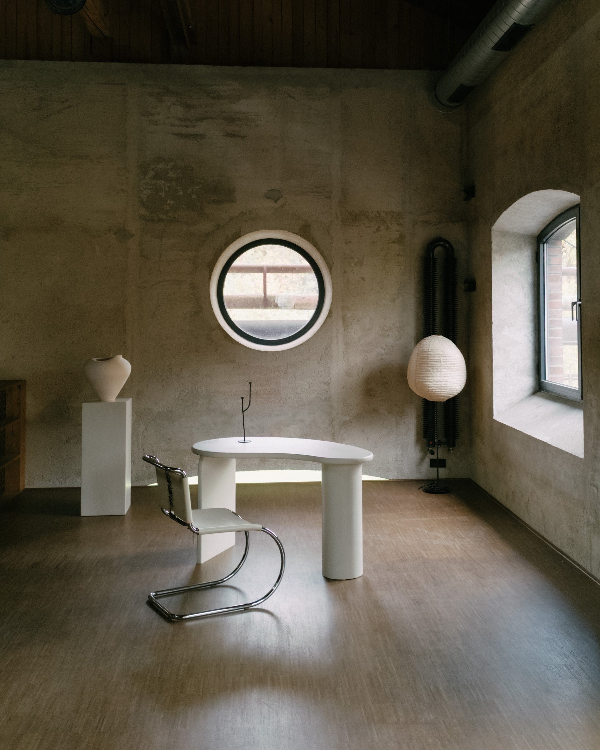 Kanso microcement work desk with kidney shape