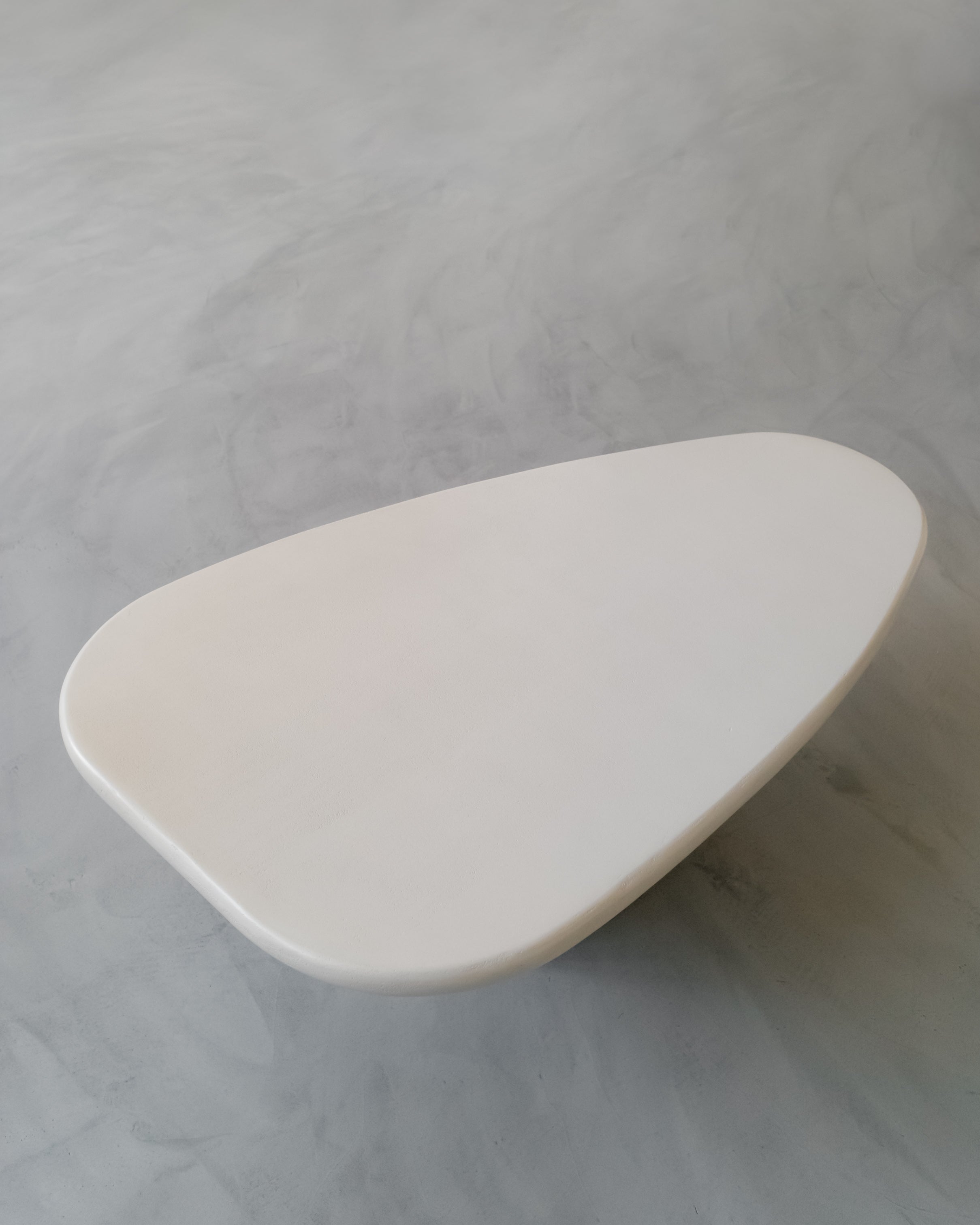 Top view of Kanso Wing coffee table showing sculptural wing-like shape