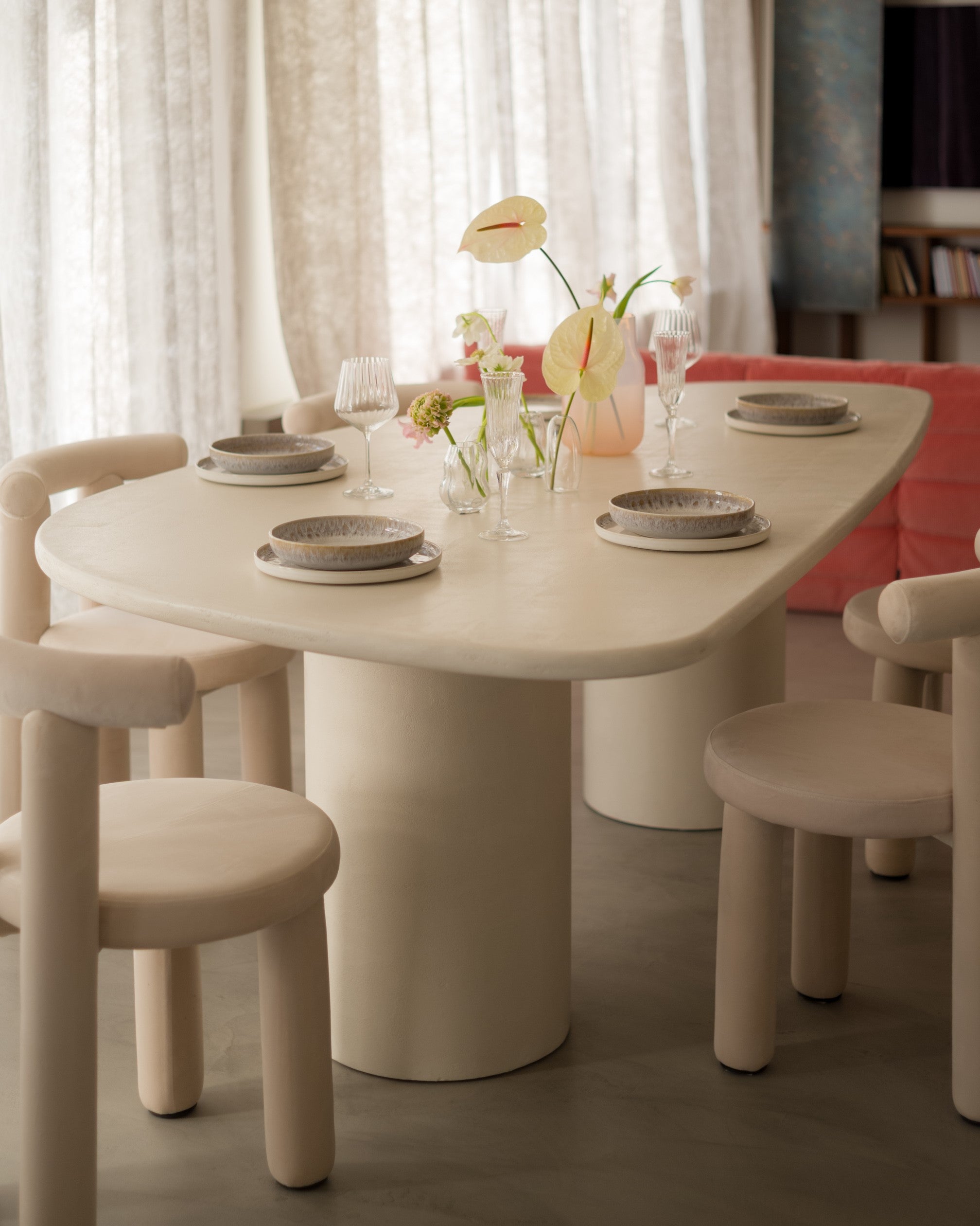 Kanso Wing dining table styled for dining with ceramics and tableware
