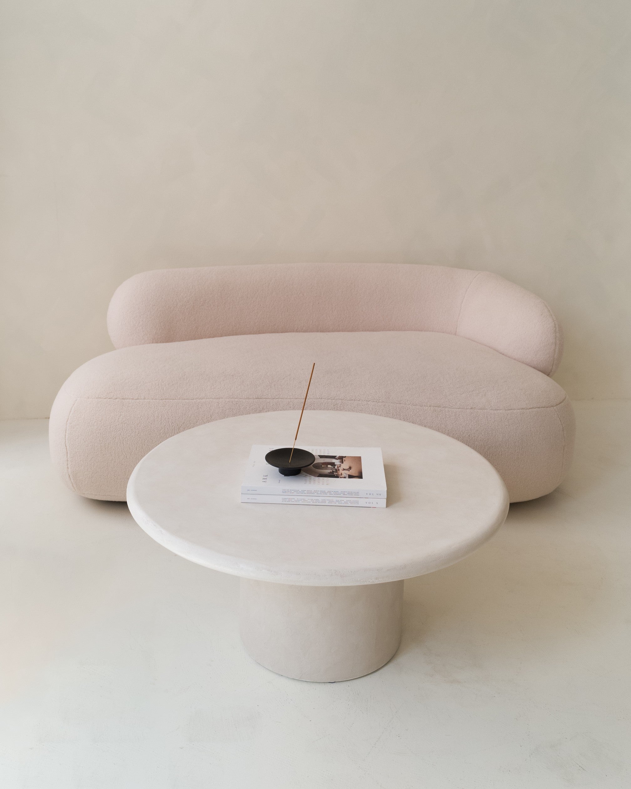 Top view of Kanso round microcement coffee table with seamless hand-applied finish