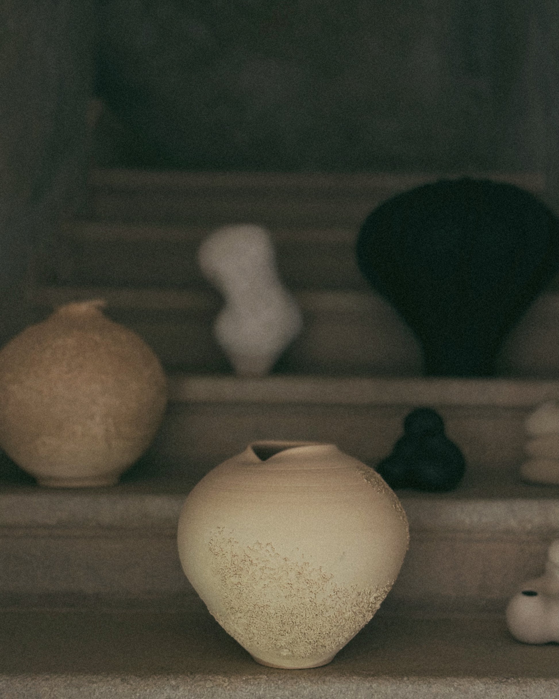 Sabi Vase no. 1, handmade ceramic vase in dark moody interior setting